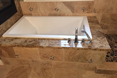 Large tuscan master beige tile bathroom photo in Sacramento with granite countertops, a one-piece toilet and green walls