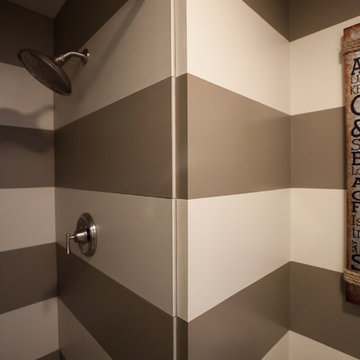 Trick of the eye bathroom remodel! Walls are painted to match the tile exactly.