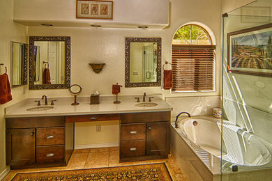 Example of an arts and crafts doorless shower design in Phoenix with an undermount sink and granite countertops