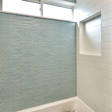 Turquoise and White Bathroom with Glass Tile