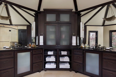 This is an example of a classic ensuite bathroom in Detroit with granite worktops.