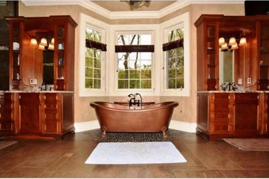 Large elegant master bathroom photo in St Louis with flat-panel cabinets, dark wood cabinets and granite countertops