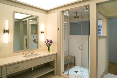 Inspiration for a contemporary alcove shower remodel in Boston with gray cabinets