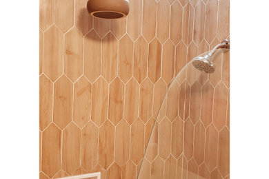 Bathroom - mid-sized contemporary master ceramic tile and multicolored tile mosaic tile floor and multicolored floor bathroom idea in Philadelphia with light wood cabinets, quartz countertops, a hinged shower door, white countertops, flat-panel cabinets, a two-piece toilet, multicolored walls and a vessel sink