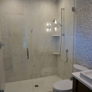Updated bath with marble and glass mosaics