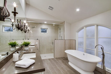 Photo of a medium sized classic ensuite bathroom in San Diego with white cabinets, a freestanding bath, an alcove shower, white walls, porcelain flooring, a submerged sink, engineered stone worktops, grey floors, a hinged door, a one-piece toilet, beige tiles, ceramic tiles and grey worktops.