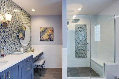 Example of a mid-sized minimalist 3/4 blue tile, gray tile, multicolored tile and stone tile slate floor and gray floor alcove shower design in New York with shaker cabinets, blue cabinets, blue walls, an undermount sink, quartzite countertops and a hinged shower door