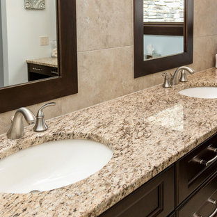 Example of a classic bathroom design in Other with granite countertops