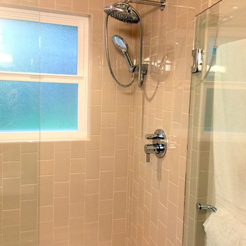Vertical two size subway tile walk in shower
