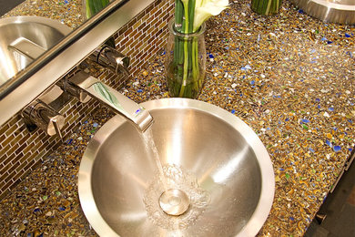 Bathroom - contemporary brown tile and glass tile slate floor bathroom idea in San Diego with recycled glass countertops