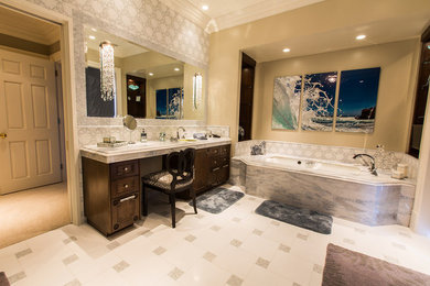Huge transitional master gray tile and stone tile ceramic tile bathroom photo in San Diego with an undermount sink, beaded inset cabinets, dark wood cabinets, marble countertops, a hot tub and beige walls