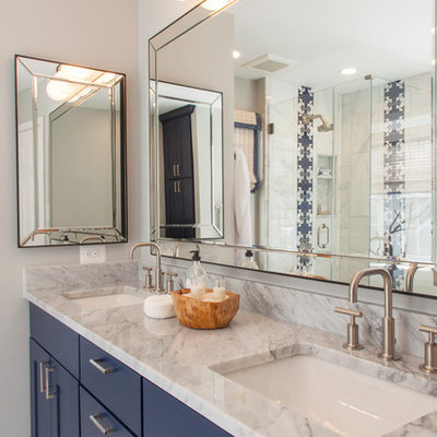Example of a small transitional master marble tile marble floor and gray floor bathroom design in DC Metro with shaker cabinets, blue cabinets, gray walls, an undermount sink, marble countertops and gray countertops