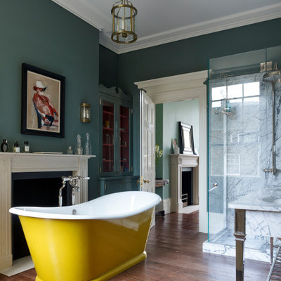 Bathroom - mid-sized victorian master white tile and marble tile medium tone wood floor and brown floor bathroom idea in London with a hinged shower door and green walls