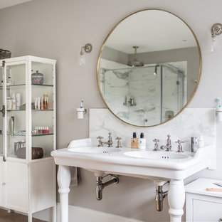 Medium sized traditional bathroom in Dorset with grey walls, a console sink, white worktops, a freestanding bath, marble tiles and marble worktops.