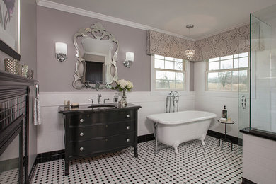 Example of a large classic master white tile and subway tile porcelain tile bathroom design in Detroit with an undermount sink, furniture-like cabinets, black cabinets, granite countertops, a two-piece toilet and gray walls