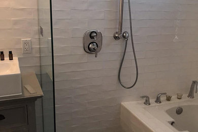 Bathroom - white tile multicolored floor bathroom idea in San Diego with white walls