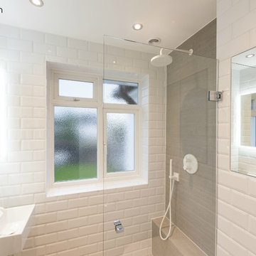 Walk-in Shower paired with Concrete Tiles and White Metro Subway Brick