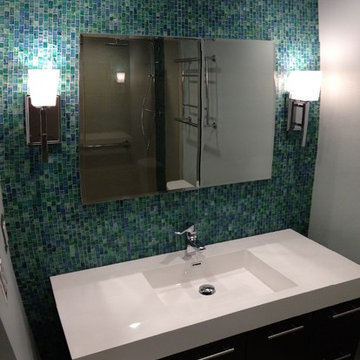 Wall-mount vanity with integrated sink and wall sconces