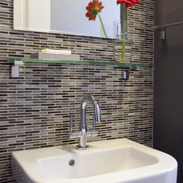 wall mounted sink w/ patterned tile