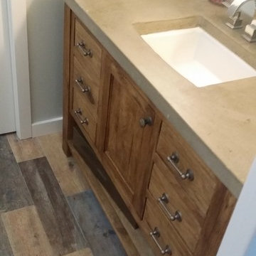 Walnut vanity with concrete top