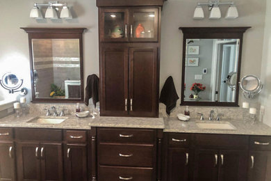 Inspiration for a large transitional master double-sink bathroom remodel in Philadelphia with dark wood cabinets, gray walls, an undermount sink, quartzite countertops, gray countertops and a built-in vanity