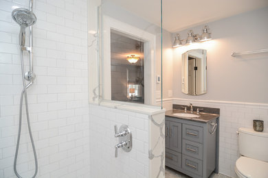 Photo of a small classic ensuite bathroom in Boston with recessed-panel cabinets, grey cabinets, a built-in shower, a two-piece toilet, white tiles, metro tiles, grey walls, marble flooring, a submerged sink, solid surface worktops, grey floors, an open shower and green worktops.