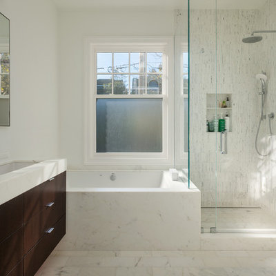 Corner shower - contemporary white tile corner shower idea in San Francisco with a trough sink, flat-panel cabinets, dark wood cabinets and an undermount tub