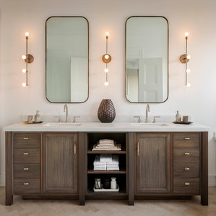 Inspiration for a transitional white tile alcove shower remodel in San Francisco with an undermount sink, dark wood cabinets, an undermount tub, white walls and recessed-panel cabinets