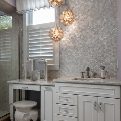 Bathroom - shabby-chic style master bathroom idea in Detroit with raised-panel cabinets, white cabinets and marble countertops