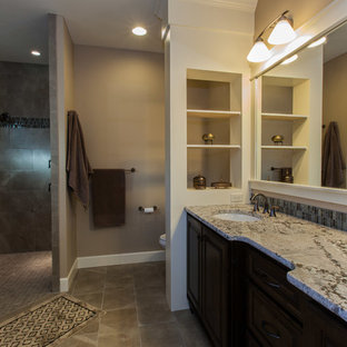 Inspiration for a large craftsman master multicolored tile walk-in shower remodel in Portland with an undermount sink, dark wood cabinets, granite countertops and multicolored walls