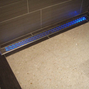 Water-activated LED shower drain