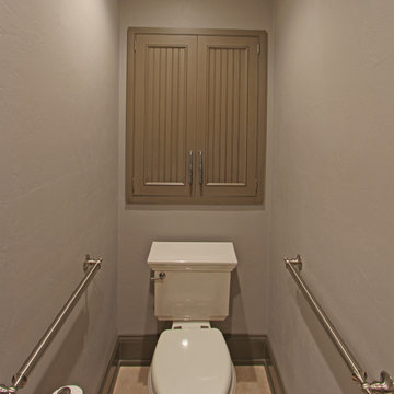 Water closet with recessed cabinet storage