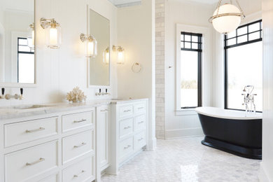 Inspiration for a large classic ensuite bathroom in Milwaukee with white cabinets, a freestanding bath, a double shower, white tiles, marble tiles, white walls, marble flooring, a submerged sink, marble worktops, grey floors, an open shower, grey worktops and recessed-panel cabinets.