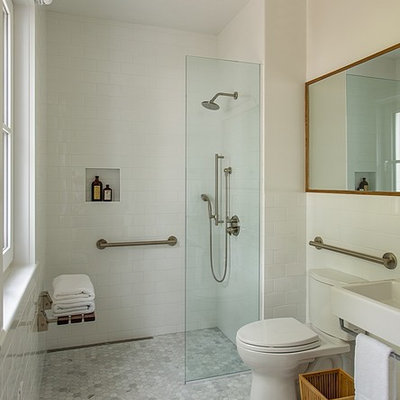 Bathroom - mid-sized contemporary 3/4 white tile and subway tile gray floor bathroom idea in Boston with a two-piece toilet, white walls and a wall-mount sink