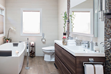 Bathroom - mid-sized modern master bathroom idea in New York with flat-panel cabinets, medium tone wood cabinets and quartz countertops
