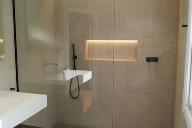 Inspiration for a medium sized contemporary wet room bathroom in Essex with beige walls, grey floors and an open shower.