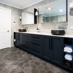 Design ideas for a large transitional master bathroom in Sydney with shaker cabinets, black cabinets, a corner shower, ceramic tile, ceramic floors, a vessel sink, tile benchtops, a hinged shower door, gray tile, grey floor and white benchtops.