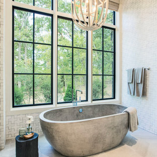 Inspiration for a coastal master white floor freestanding bathtub remodel in Dallas with white walls
