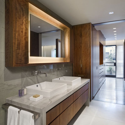 Inspiration for a contemporary bathroom remodel in New York with a vessel sink