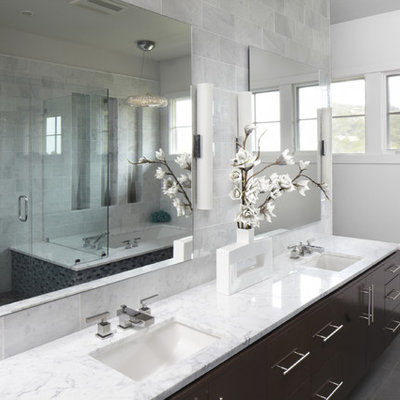 Inspiration for a contemporary bathroom remodel in Austin with marble countertops