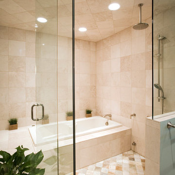 Wet Room featuring Spa Tub and Rain Forest Shower Head