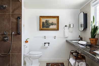 Mid-sized transitional master brown tile and ceramic tile ceramic tile, beige floor and double-sink bathroom photo in San Diego with black cabinets, a two-piece toilet, white walls, an undermount sink, granite countertops, black countertops, a niche and a floating vanity