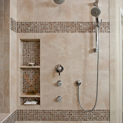 Example of a trendy beige tile and brown tile bathroom design in Phoenix with a niche