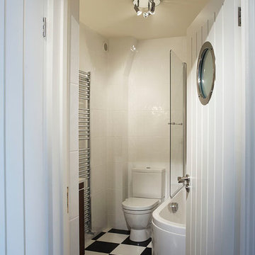 White bathroom with chrome and black accents
