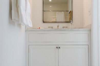 White Bathroom with Marble Vanity