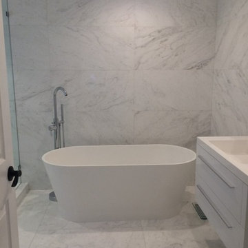 White Himalaya Marble Bathroom - Fort Lauderdale Residence