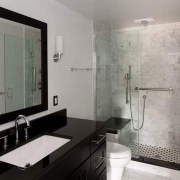 White Marble Bathroom with Black Cabinets