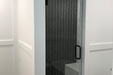 Inspiration for a small traditional ensuite bathroom in Dallas with flat-panel cabinets, dark wood cabinets, a freestanding bath, an alcove shower, a two-piece toilet, multi-coloured tiles, marble tiles, white walls, marble flooring, a console sink, engineered stone worktops, white floors, a hinged door and white worktops.
