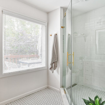White Subway Tile Shower with Brass Hardware