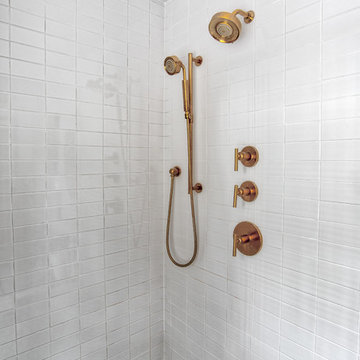 White Subway Tile Shower with Brass Hardware